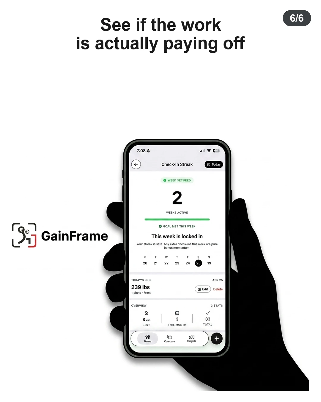 A hand holds a smartphone displaying progress tracking on the GainFrame app.