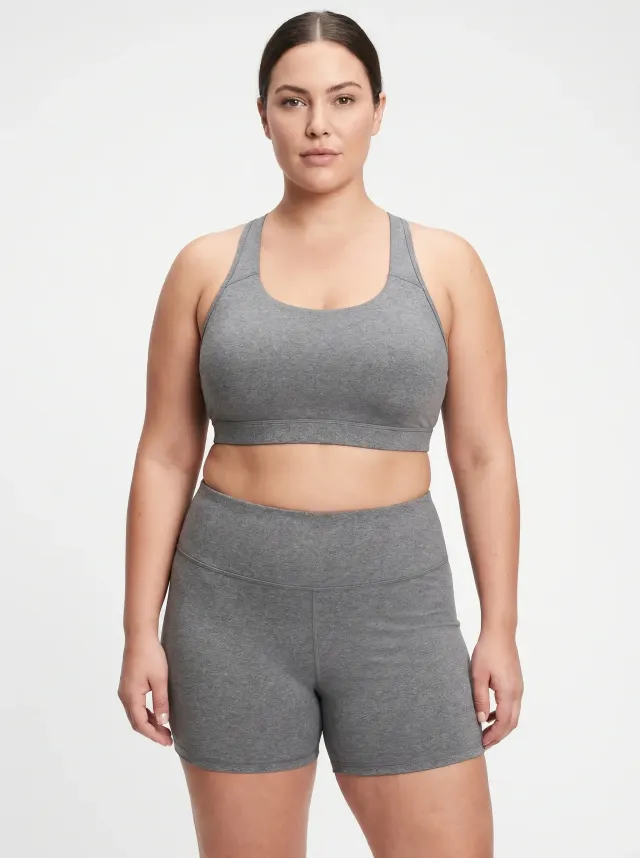 Standardized render of the same woman at 37 percent body fat showing several inches more waist circumference