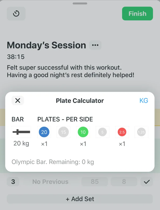 Strong's plate calculator open over a logged session — a 20 kg Olympic bar with the exact per-side plates to load for the target weight