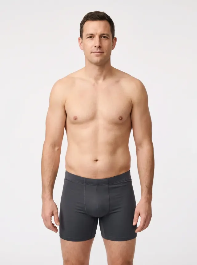 Standardized render of the same man at 23 percent body fat around month four to six of body recomposition, visibly smaller waist and early shoulder and chest shape