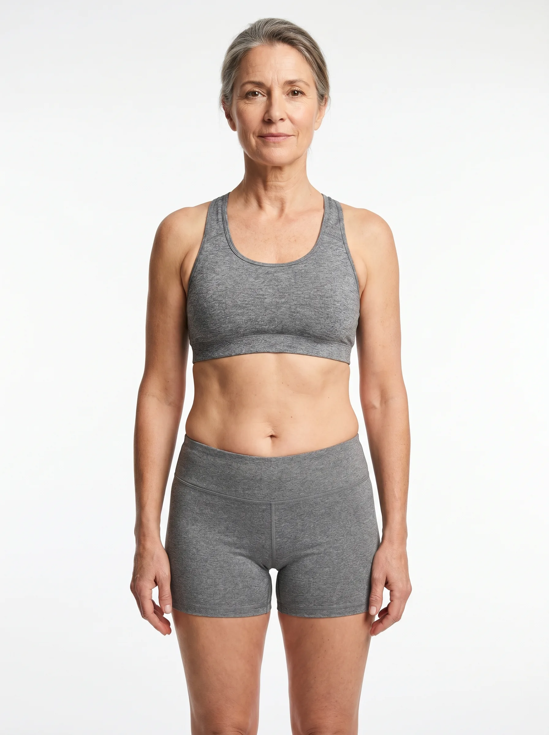 Standardized render of a woman in her 50s at 27 percent body fat, healthy range with weight distributed through hips and thighs
